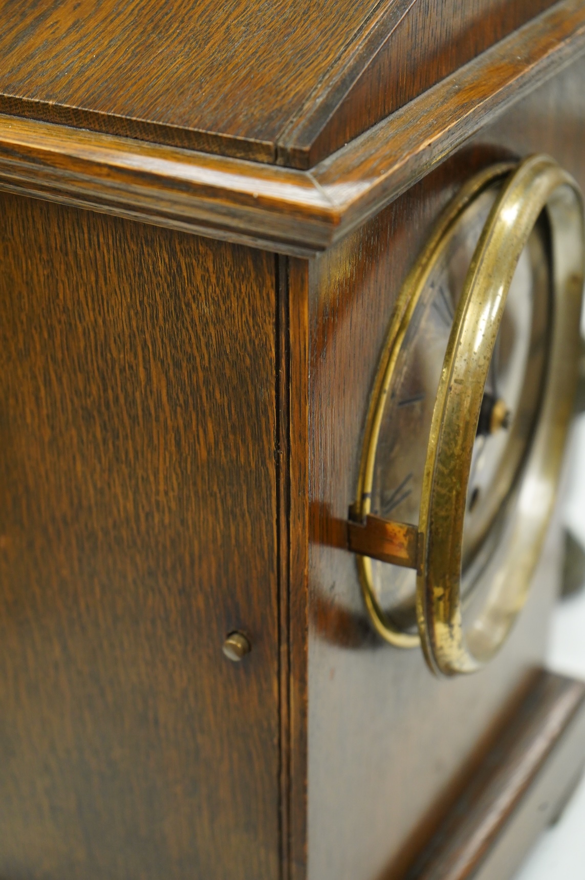 A RAF oak cased Officer's Mess mantel timepiece, with winding key, case key and pendulum, silvered dial engraved with crowned RAF surrounded by laurel insignia, and an 8 day fusee movement by F.W. Elliott, dated 1938, 35